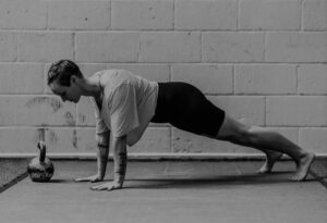 Strong woman in plank black and white